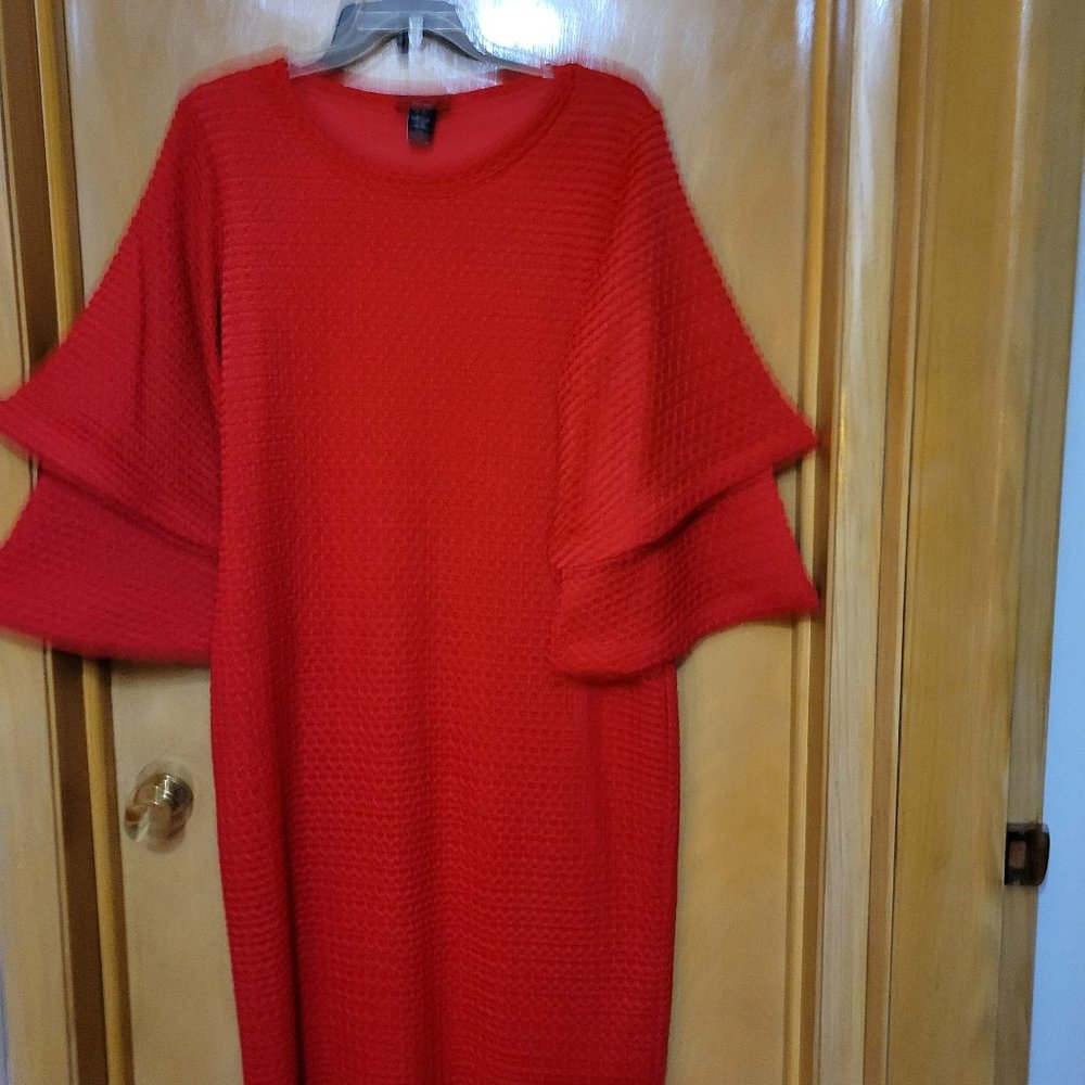 Celebrate Andre Talley with this Bell sleeve dress.